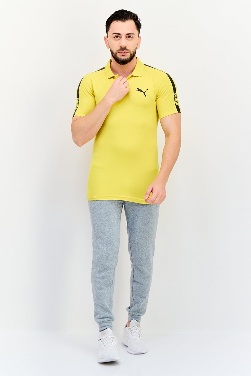 PUMA قمصان بولو قصيرة الأكمام للرجال بتصميم نحيف، أصفر داكن - Image 4